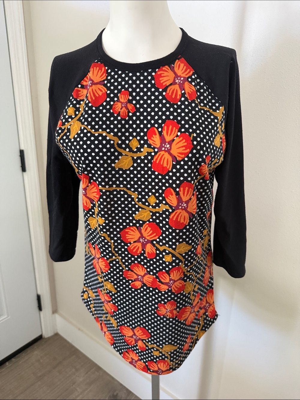 LuLaRoe Black Floral Dot Raglan Top with Red & Gold Flowers